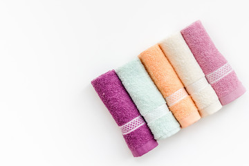Fototapeta na wymiar high quality cotton towels set on white background top view mock up