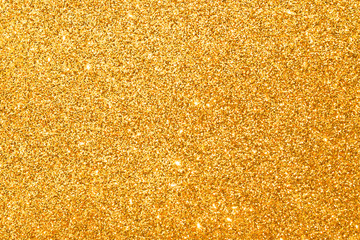 sparkle of golden glitter abstract background	