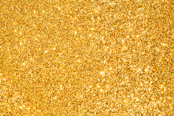 sparkle of golden glitter abstract background	