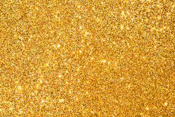sparkle of golden glitter abstract background	