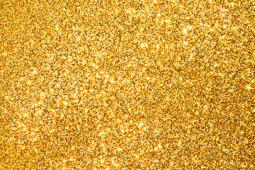sparkle of golden glitter abstract background	