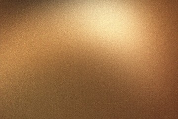 Glowing brushed bronze metal wall, abstract texture background
