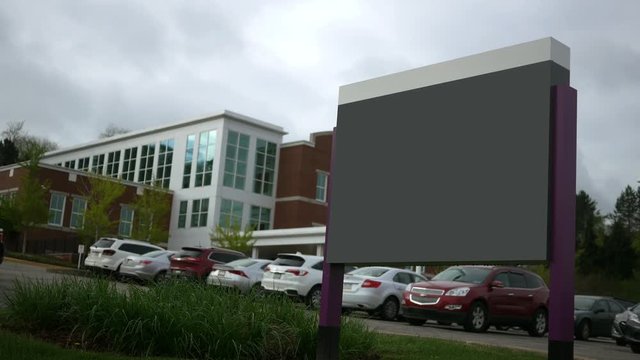 Modern blank establishing shot signage with building in background - timelapse