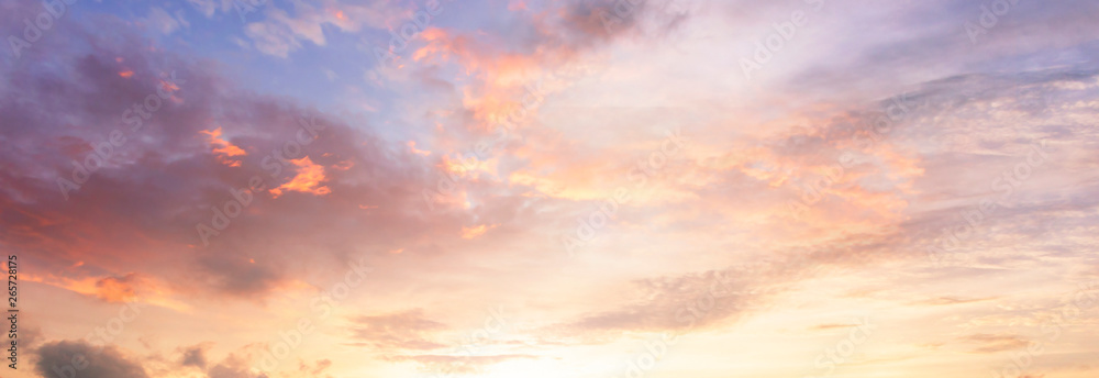Wall mural background of colorful sky concept: dramatic sunset with twilight color sky and clouds