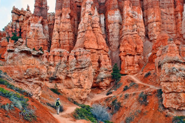 Hiker among the hoodoos in Utah's Bruce Canyon National Park