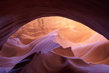 Lower slot canyon in Arizona is an amazing place to visit with light bouncing off the wall creating nature abstract artwork. Your camera ISO should be set to 800 plus with a fast lens for a good image