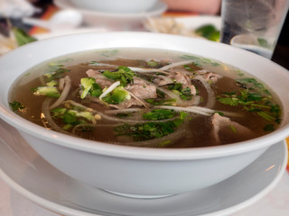 Close up of Bowl of Pho Tai Soup