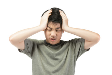 Fototapeta premium Portrait Young Asian boy over white background, be upset; have a bad temper emotional portrait of teen boy wearing t-shirt. Thoughtful teenager, isolated on white background. 
