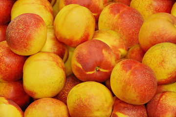 fruit background texture. nectarine peach yellow red ripe fruit. Fresh ripe food.