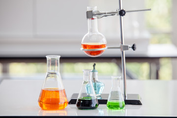 Assorted laboratory glassware equipment ready for an experiment in a science research lab....