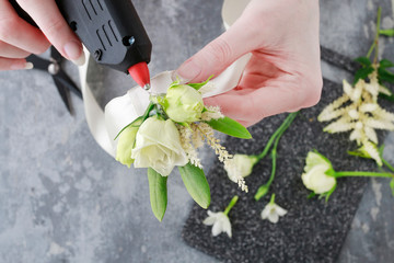 How to make wrist corsage for bride using rose and eustoma flowers.