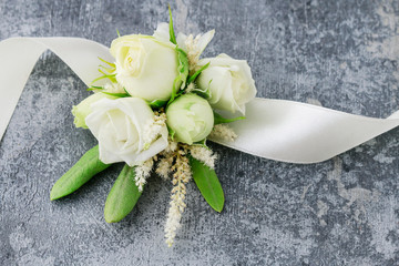 How to make wrist corsage for bride using rose and eustoma flowers.
