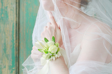 How to make wrist corsage for bride using rose and eustoma flowers.