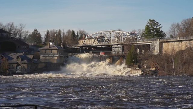 Timelapse of flood water fowing over a dam in Bracebridge Ontario, Canada.