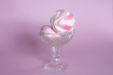 colorful marshmallows - zephyrs on pink background. Colorful meringues on pink. Many sweet zephyrs. Trendy top view dessert image.