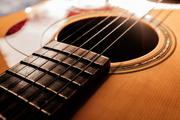 close up of an acoustic guitar
