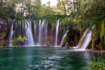 Fototapeta na wymiar Dreamy waterfall in Plitvice Lakes National Park, Croatia
