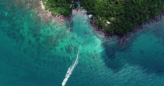 Phu Quoc Island by fly cam QUA G&Oacute;C NH&Igrave;N .Aerial view for beautiful beach with palms and crystal clear water 