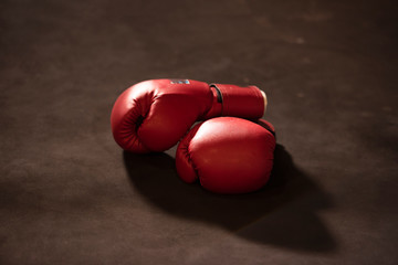 Fototapeta  gloves on a white background close up Boxing gloves on lowkey obraz