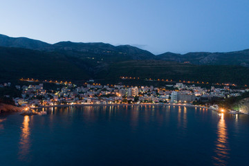 Fototapeta premium Aerial view of the town of Petrovac at dusk