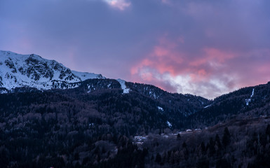 Fototapeta premium Red sunset in Bormio, Sondrio, Italy. January 2019.