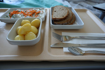 Dill snack with butter cheese and potatoes in a canteen in Germany