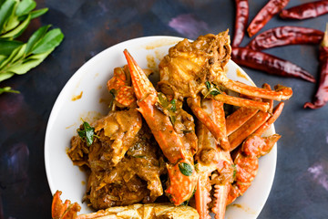 Spicy chili crab curry, a famous seafood dish in Sri Lanka, India and Singapore. © Paskaran