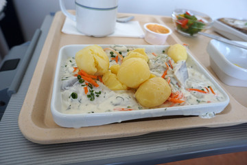 Dill snack with butter cheese and potatoes in a canteen in Germany