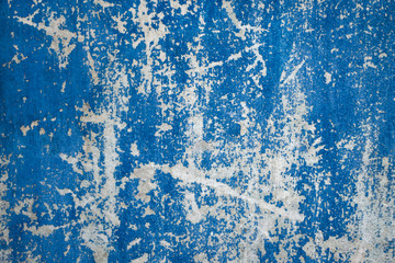 background of the old wooden wall with cracked, shabby, shabby blue paint.