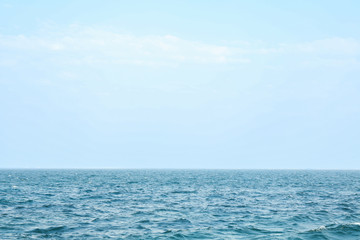 Blue sea water surface against sky. Space for text