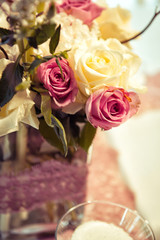  Wedding decorations. Rings on textiles, decorations with fresh flowers, candles, catering in purple tone. Stylish holiday atmosphere.