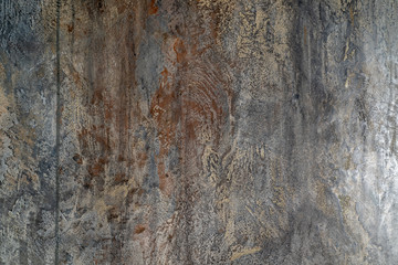 Textured wall of old shabby wood. The tree is painted in gray, brown, beige and turquoise. Texture for the background