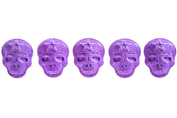 amphetamine, Blue, pink, purple army Skull, Ecstasy, XTC pills isolated on a white background.