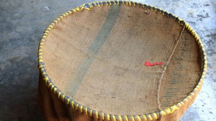 Naklejka premium burlap hessian sacking on concrete background