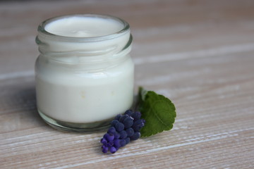 Organic face cream with purple flowers