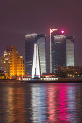 Fototapeta premium The bund of Shanghai huangpu river of tall buildings in the evening.