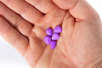 amphetamine, Blue, pink, purple army Skull, Ecstasy, XTC pills isolated on a white background.