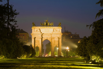 Fototapeta na wymiar View of the old Triumphal Arch (Porta Sempione) in September night, Milan
