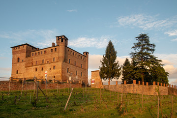 Low angle view of the medieval castle (13th century) of Grinzane Cavour in the Langhe region, UNESCO World Heritage Site since 2014, was the residence of the Count of Cavour, Italy 