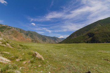 Mountain landscape with clouds. Summer sunny day.
