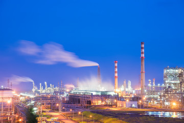 Oil refineries and oil depots and close-up of pipelines and destillation tanks of an oil-refinery...