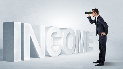 Handsome businessman looking forward with binoculars at a job, income and money concept
