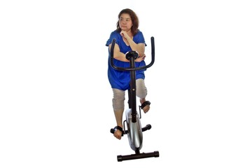 Fat women wear a blue shirt are exercising by cycling, isolated on white background.