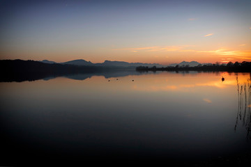 sunset by a lake, wallersee, austria