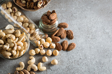 mix of nuts on a wooden table