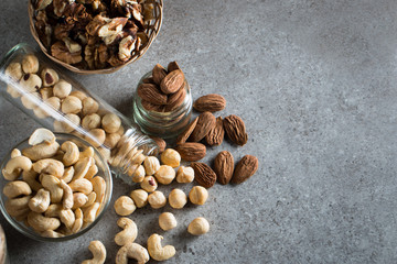 mix of nuts on a wooden table