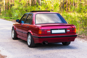 The rear of the old, red, German car