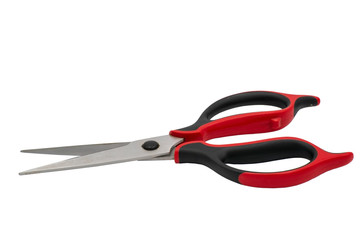 Large steel scissors with plastic handles. Isolate