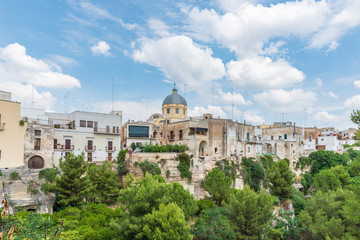 Obraz premium Massafra and its ravines. Houses built in the rock. Puglia to discover. Italy