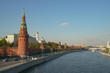 Obraz premium Moscow cityscape. Red Kremlin wall, Residence of the President of the Russian Federation, Ivan the Great Belltower, Moskva river and highways nearby